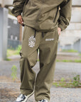 FIRE IRON CROSS EMBROIDERY NYLON PANTS